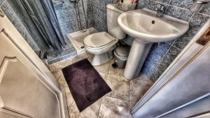 Ein Badezimmer in der Unterkunft BeachHouse