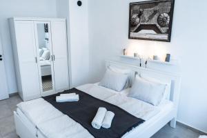 Postel nebo postele na pokoji v ubytování Apartmány Pulgary