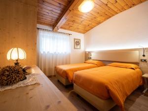 Voodi või voodid majutusasutuse Hotel Adriana toas
