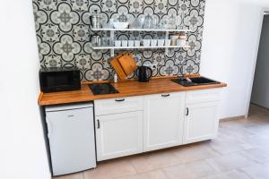 Kuchyň nebo kuchyňský kout v ubytování Apartmány Pulgary