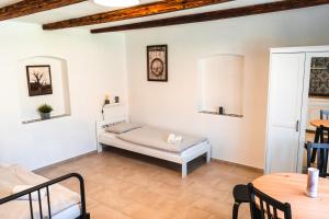 Postel nebo postele na pokoji v ubytování Apartmány Pulgary