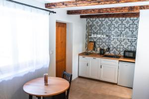 Kuchyň nebo kuchyňský kout v ubytování Apartmány Pulgary