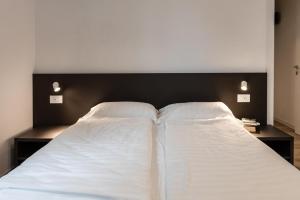Postel nebo postele na pokoji v ubytování Residence Solei Classic & Plus