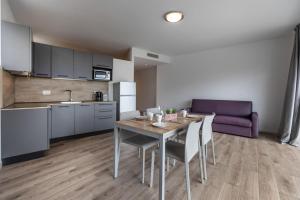 Kuchyň nebo kuchyňský kout v ubytování Residence Solei Classic & Plus