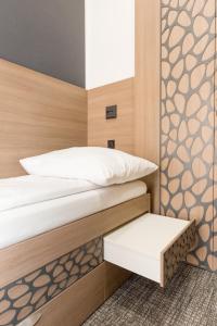 Postel nebo postele na pokoji v ubytování E14 Design Hostel