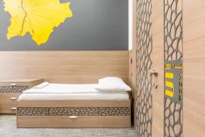 Postel nebo postele na pokoji v ubytování E14 Design Hostel