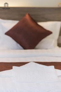 Twin Hotel Kampot客房内的一张或多张床位