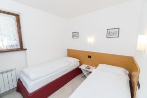 Postel nebo postele na pokoji v ubytování Casa Alberta