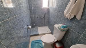 Ein Badezimmer in der Unterkunft BeachHouse