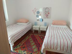 A bed or beds in a room at Apartment Nebo