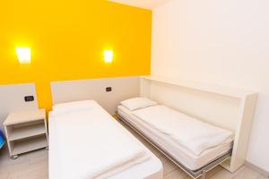 Postel nebo postele na pokoji v ubytování Casa Alberta