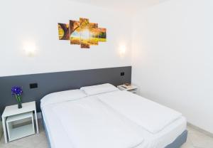 Postel nebo postele na pokoji v ubytování Casa Alberta