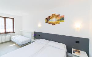 Postel nebo postele na pokoji v ubytování Casa Alberta