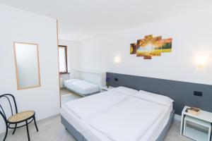 Postel nebo postele na pokoji v ubytování Casa Alberta
