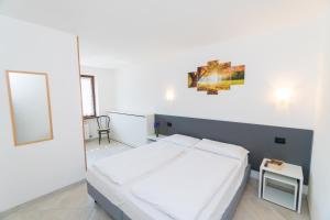 Postel nebo postele na pokoji v ubytování Casa Alberta