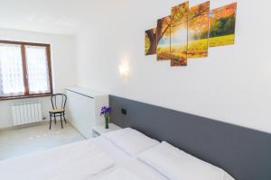 Postel nebo postele na pokoji v ubytování Casa Alberta