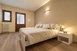 Postel nebo postele na pokoji v ubytování B&B ul calus