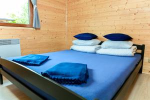 Postel nebo postele na pokoji v ubytování Domek na Słonecznikowej