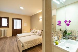 Voodi või voodid majutusasutuse B&B ul calus toas