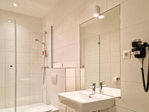 Ένα μπάνιο στο Pension Mozart - Newly Renovated