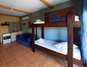 Postel nebo postele na pokoji v ubytování O Xenonas Ton Mylon