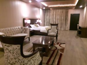Maple Leaf Hotel客房内的一张或多张床位