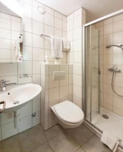 Et badeværelse på Serviced Apartments Wallis
