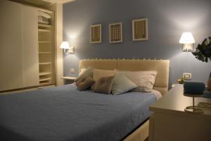 A bed or beds in a room at Quattro Canti Valù