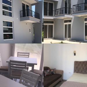 a living room with a table and a balcony at Belami luxury apartments in Ulcinj