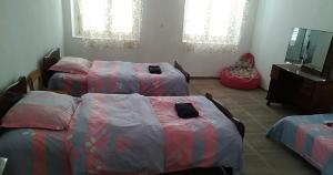 Letto o letti in una camera di Cabernet Tali
