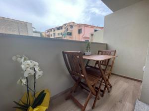 Admayora Guest House tesisinde bir balkon veya teras