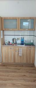 Kuchyňa alebo kuchynka v ubytovaní Mini Apartamenty Dominika