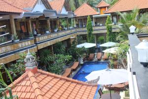 an overhead view of a resort with a swimming pool at Nitya Home Stay Lembongan in Nusa Lembongan