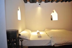 Letto o letti in una camera di Peacock Guest House