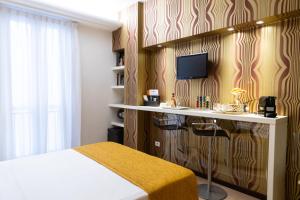 Postel nebo postele na pokoji v ubytování Relais La Torre