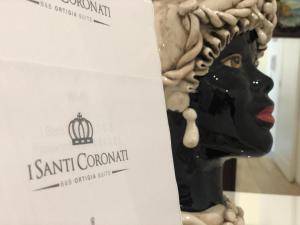 Certifikát, hodnocení, plakát nebo jiný dokument vystavený v ubytování I Santi Coronati
