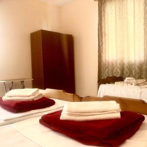 Letto o letti in una camera di Nika Inn Kobuleti