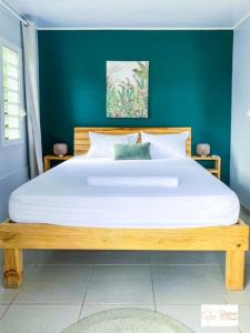 Ein Bett oder Betten in einem Zimmer der Unterkunft résidence ti punch