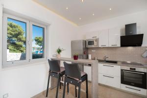 Kuchyň nebo kuchyňský kout v ubytování Beach Residences Caroline