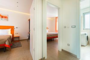 Postel nebo postele na pokoji v ubytování Beach Residences Caroline