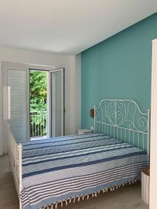 A bed or beds in a room at Artaleammare