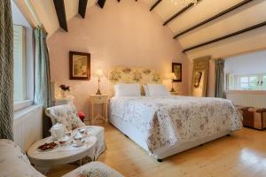 Ένα ή περισσότερα κρεβάτια σε δωμάτιο στο Weir Haven Boutique Accommodation