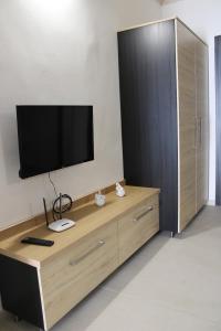 TV a/nebo společenská místnost v ubytování La Casetta 2.0