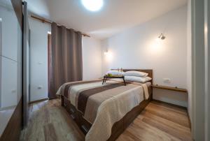 Postel nebo postele na pokoji v ubytování VILLA KARLA + 37 fotografií