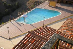 an overhead view of a large swimming pool at Villa sul mare panorama unico in Nebida