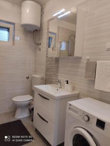 Koupelna v ubytování Apartman Šuperba A2 + 20 fotografií