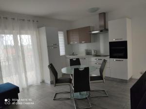 Kuchyň nebo kuchyňský kout v ubytování Apartman Šuperba A2