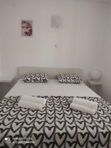 Postel nebo postele na pokoji v ubytování Apartman Šuperba A2