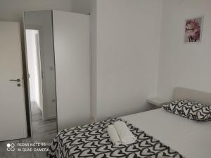 Postel nebo postele na pokoji v ubytování Apartman Šuperba A2