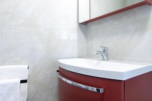 Koupelna v ubytování Apartmani "RUŽA"